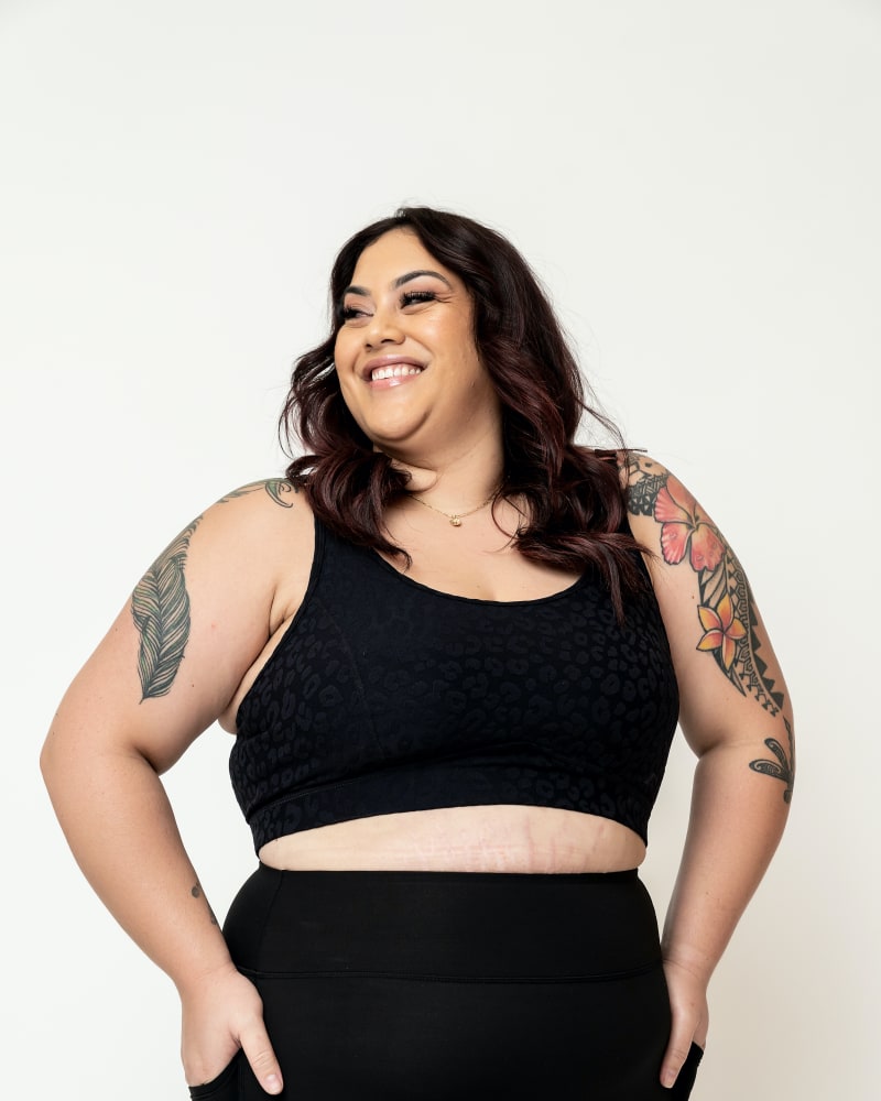 Front of a model wearing a size 3XL Olivia Sports Bra *Leopard in Black Leopard by Gold Elite Apparel. | dia_product_style_image_id:284722